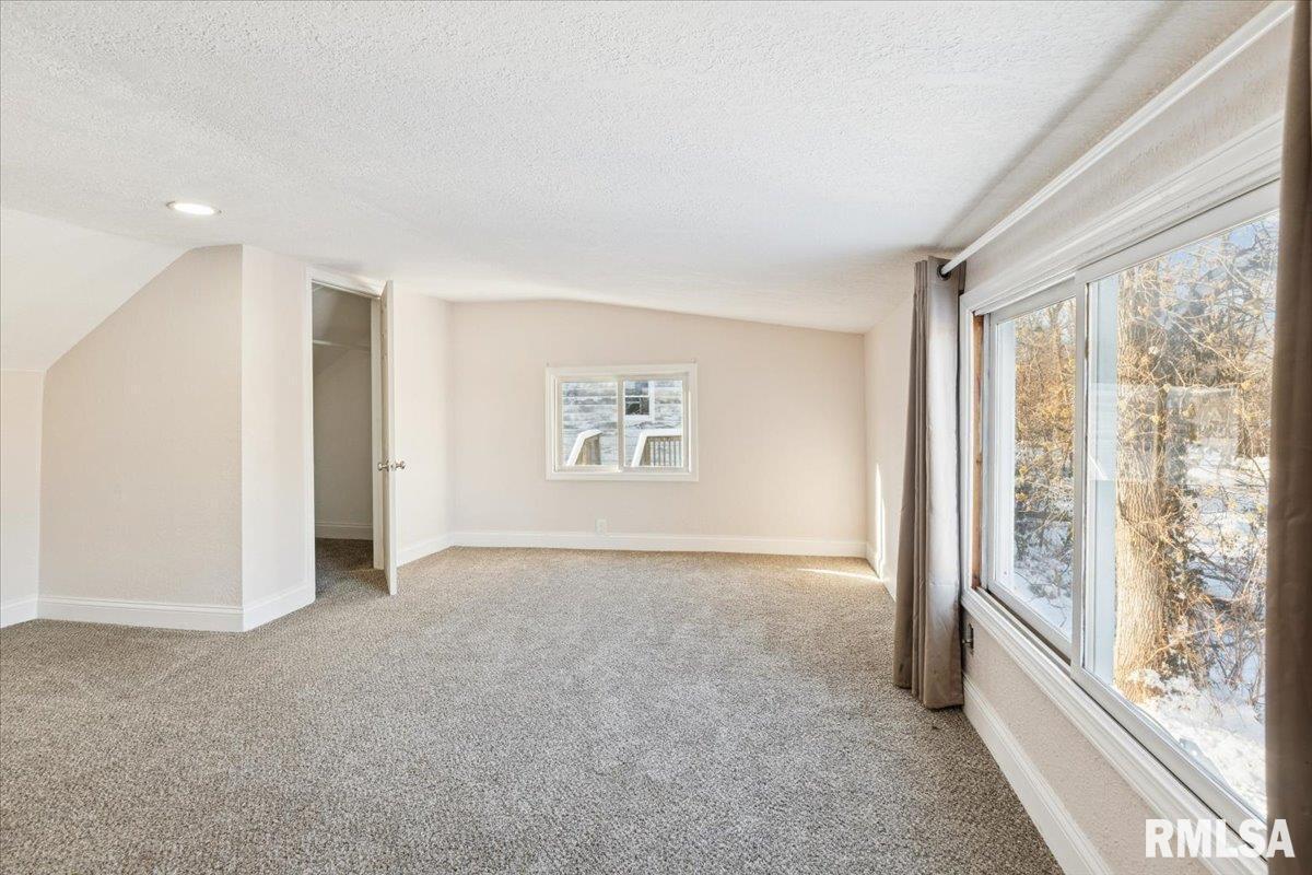 3312 Garfield Street Clinton, IA 52732 - Photo 18 of 31 a view of an empty room with a window