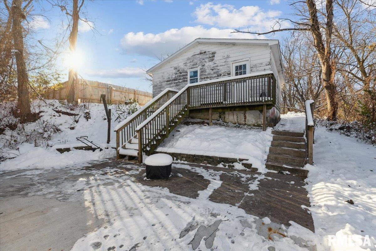 3312 Garfield Street Clinton, IA 52732 - Photo 28 of 31 a view of roof deck with chair and wooden floor