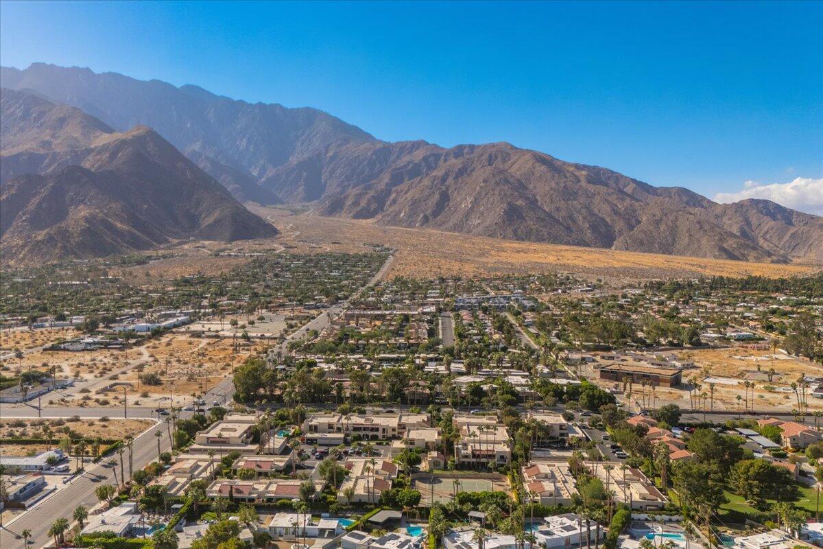 200 East Racquet Club Road, Unit 31 Palm Springs, CA 92262 - Photo 39 of 49 a view of a city with mountains in the background