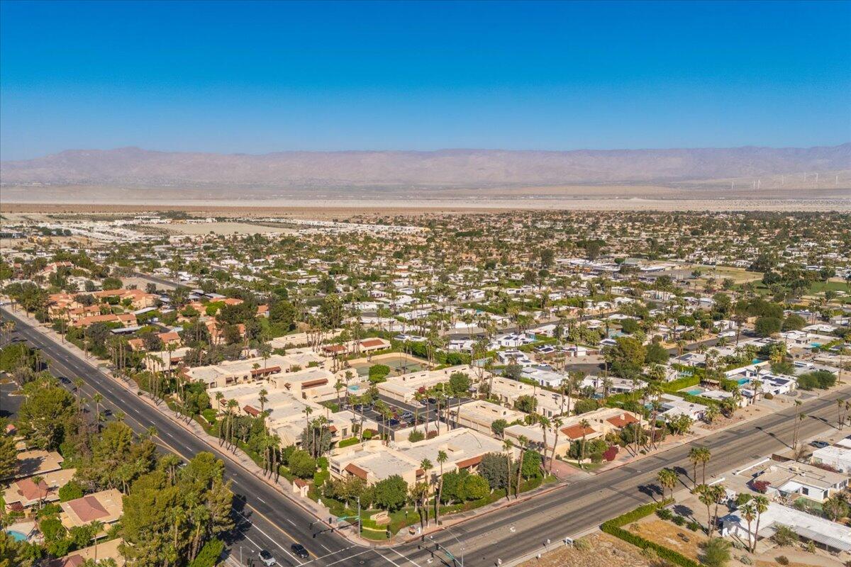 200 East Racquet Club Road, Unit 31 Palm Springs, CA 92262 - Photo 42 of 49 an aerial view of residential building and ocean