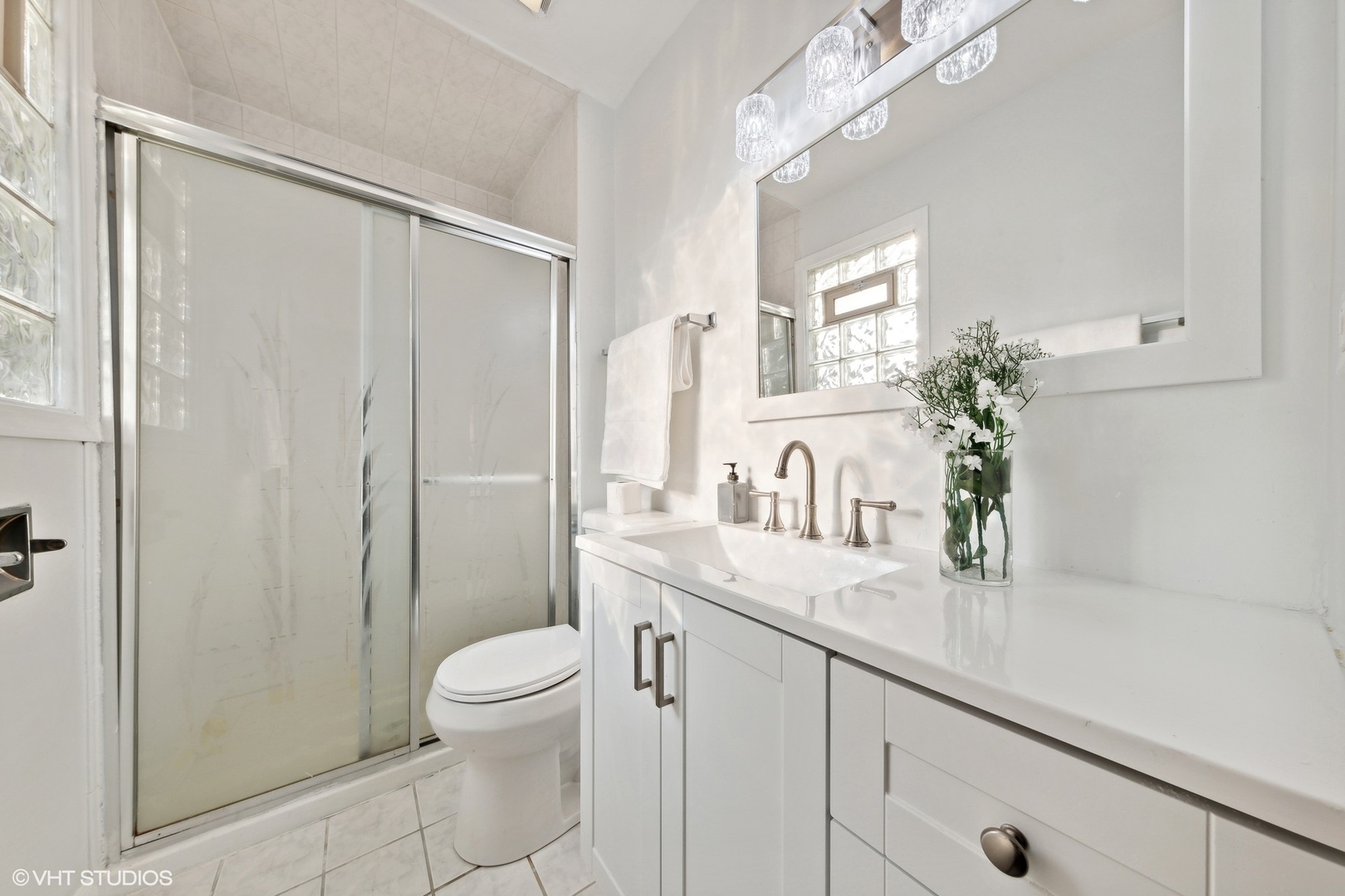 902 Maple Road Flossmoor, IL 60422 - Photo 14 of 27 a bathroom with a granite countertop sink a toilet and shower