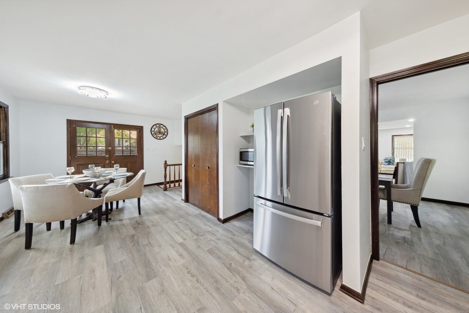 902 Maple Road Flossmoor, IL 60422 - Photo 9 of 27 a view of a dining room with furniture window and wooden floor