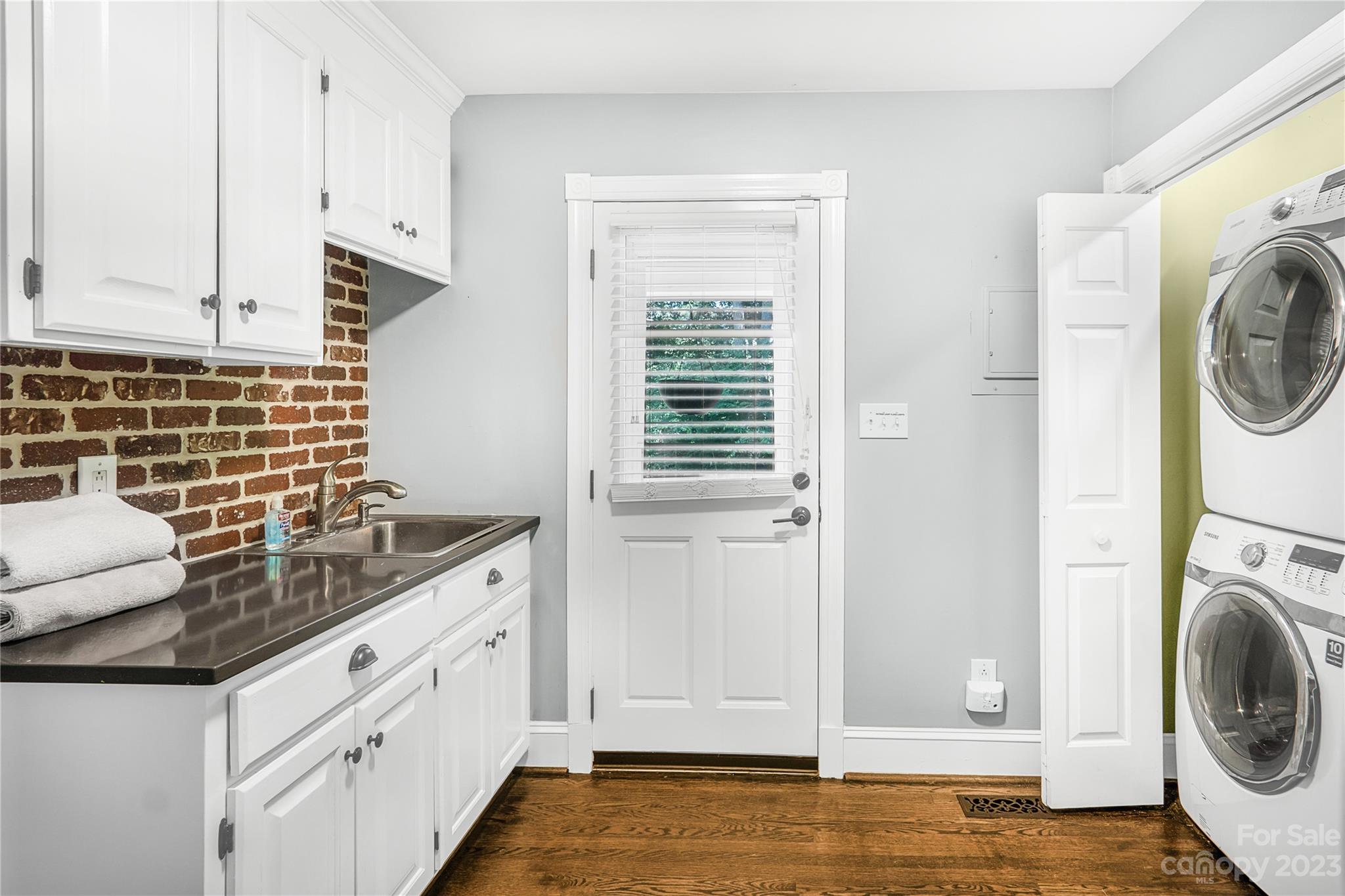 4339 Quail View Road Charlotte, NC 28226 - Photo 36 of 40 a view of a kitchen with sink washer and dryer