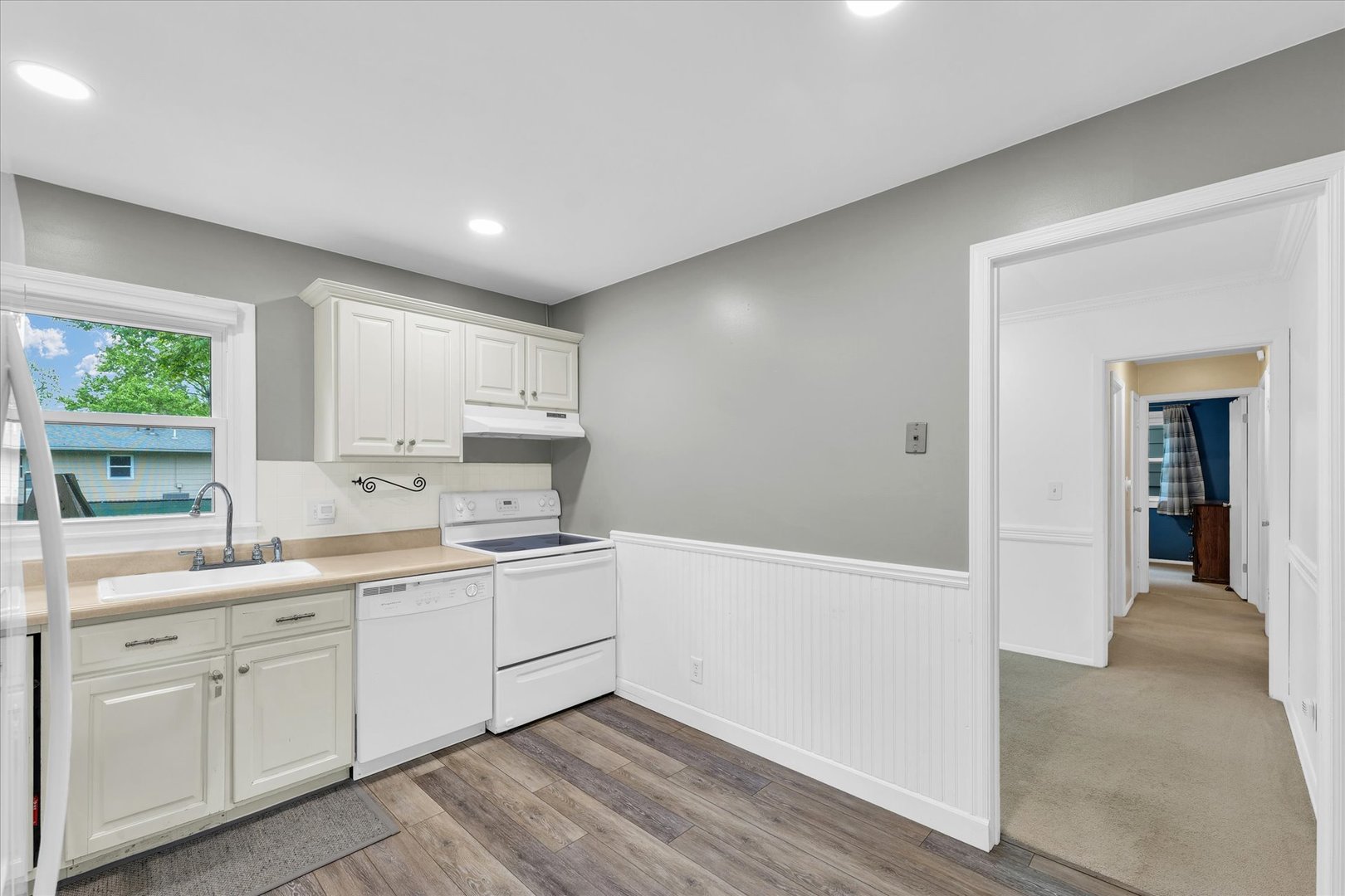 2603 Trafalgar Square Champaign, IL 61821 - Photo 12 of 32 a view of a kitchen with a sink