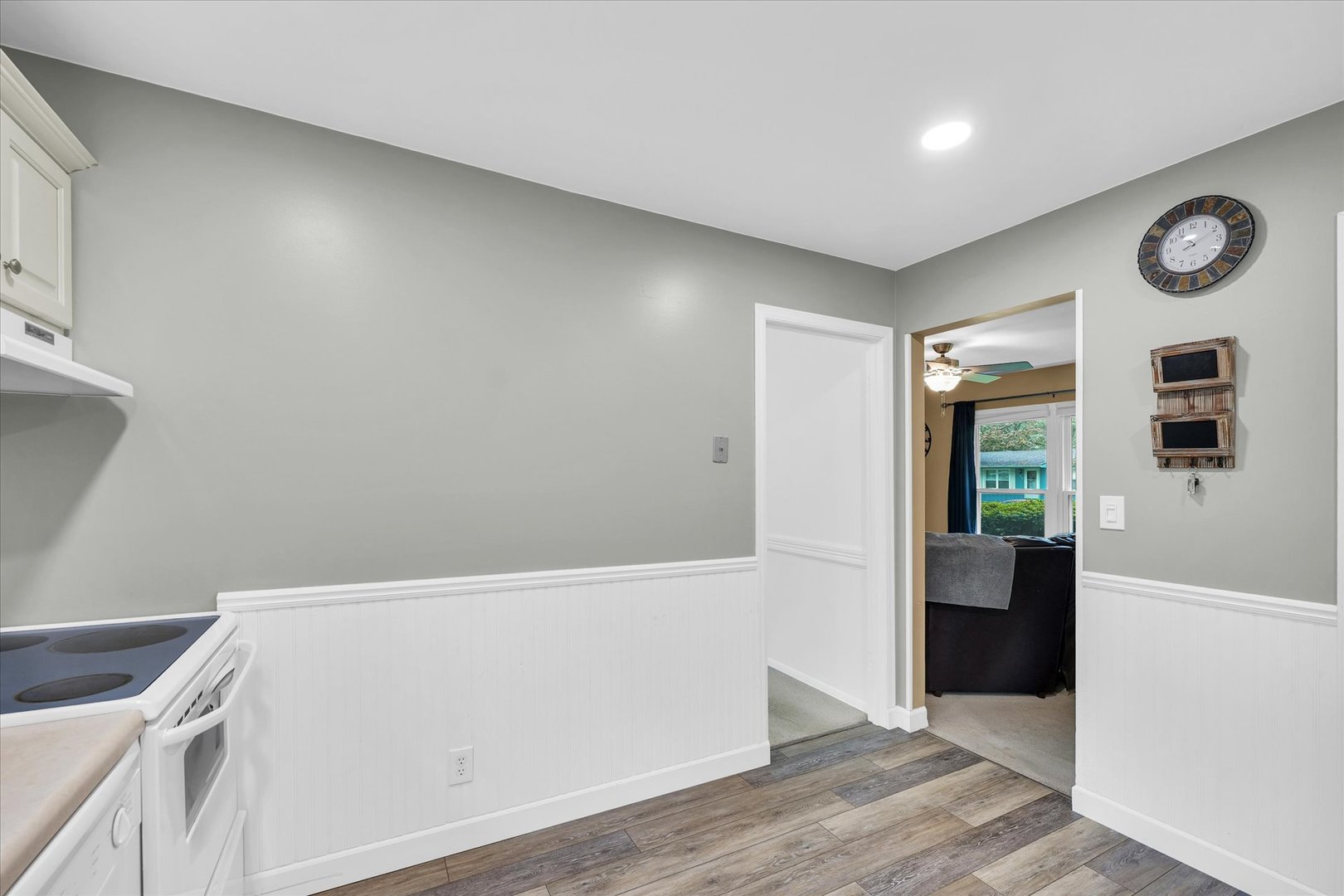 2603 Trafalgar Square Champaign, IL 61821 - Photo 14 of 32 a view of an empty room with wooden floor