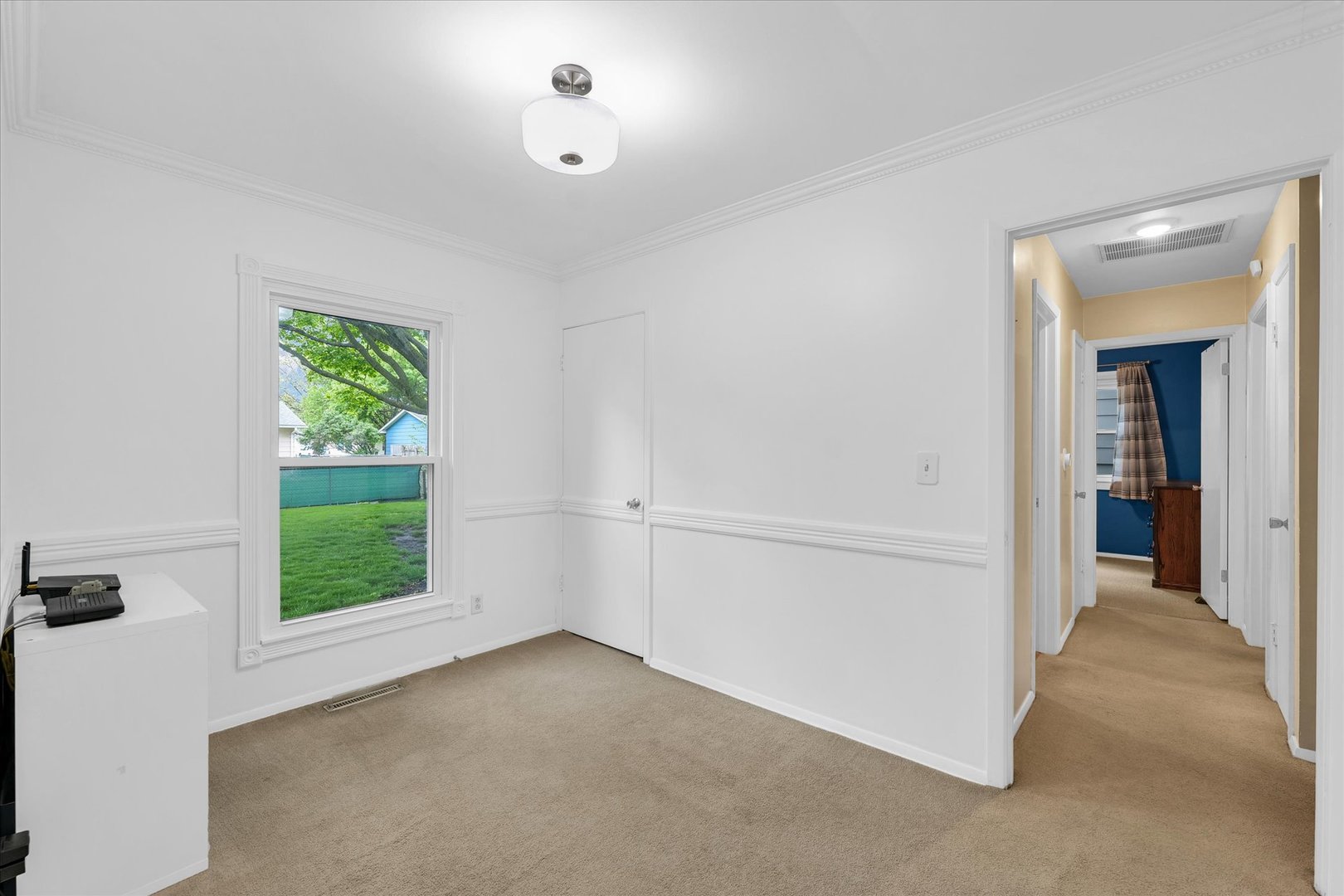 2603 Trafalgar Square Champaign, IL 61821 - Photo 15 of 32 an empty room with windows and closet
