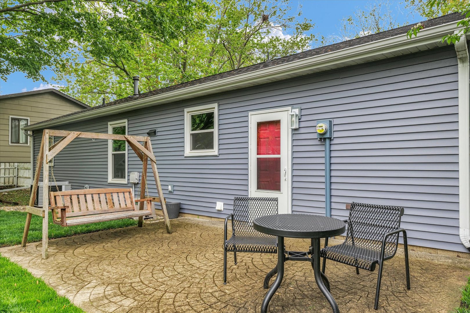 2603 Trafalgar Square Champaign, IL 61821 - Photo 25 of 32 a backyard of a house with table and chairs