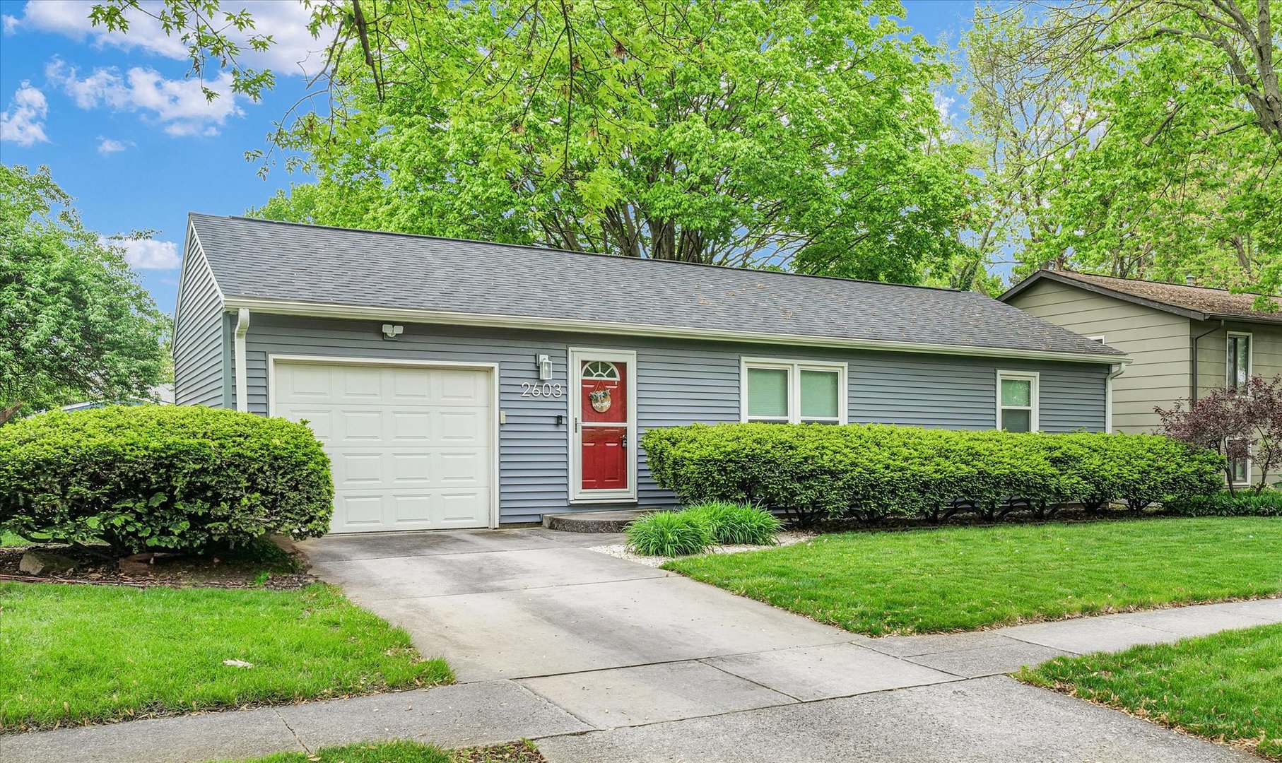 2603 Trafalgar Square Champaign, IL 61821 - Photo 3 of 32 front view of a house and a yard