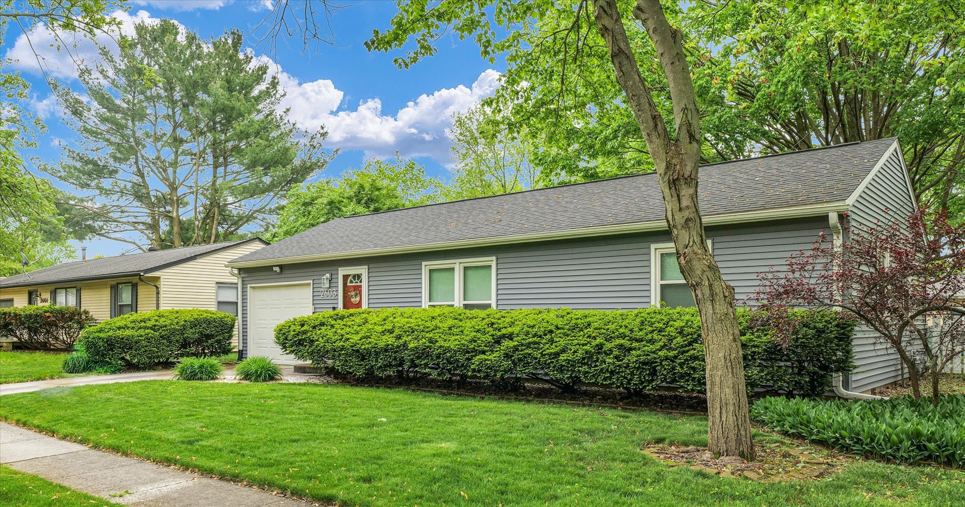 2603 Trafalgar Square Champaign, IL 61821 - Photo 4 of 32 a view of a house with a yard