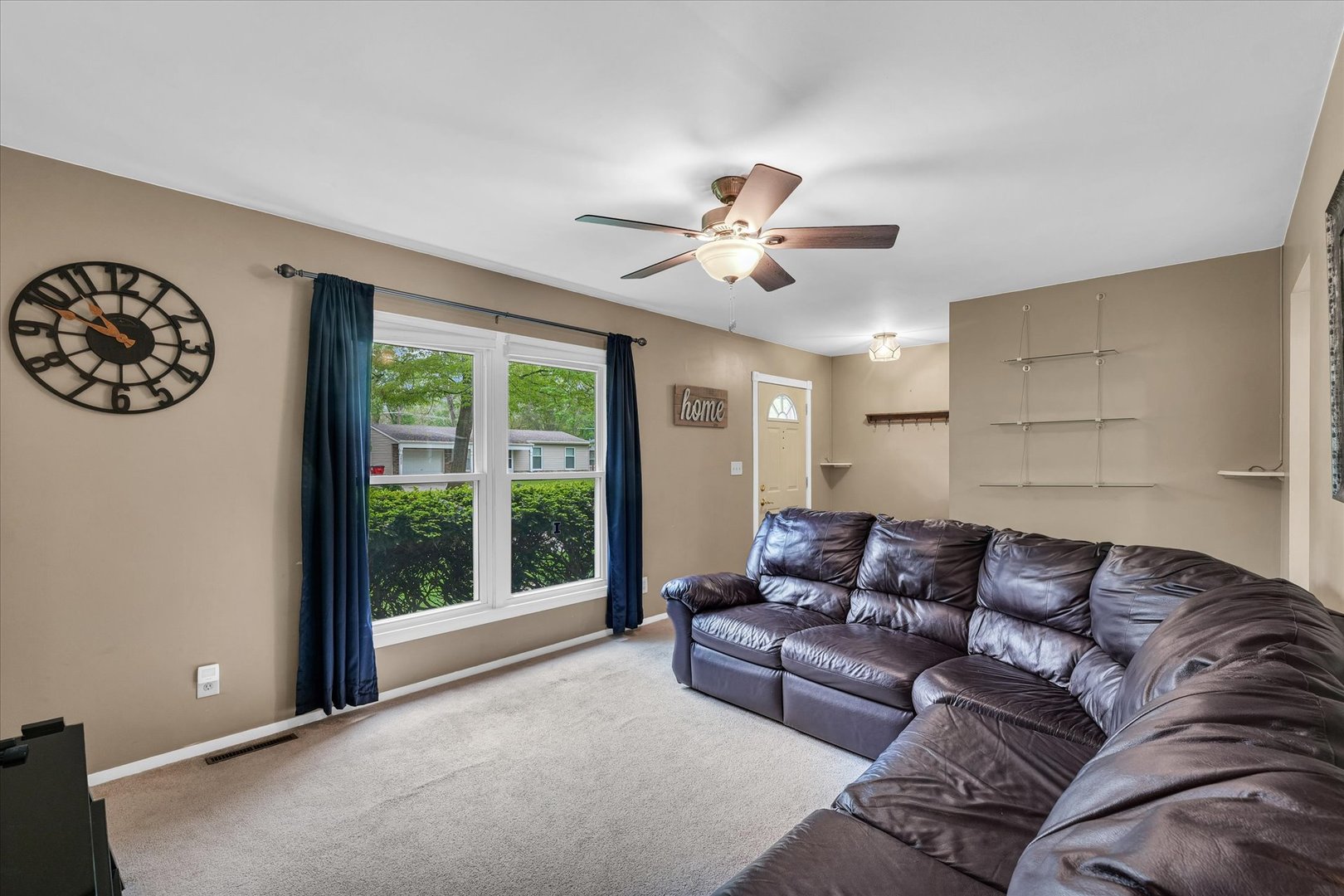 2603 Trafalgar Square Champaign, IL 61821 - Photo 8 of 32 a living room with furniture and a large window