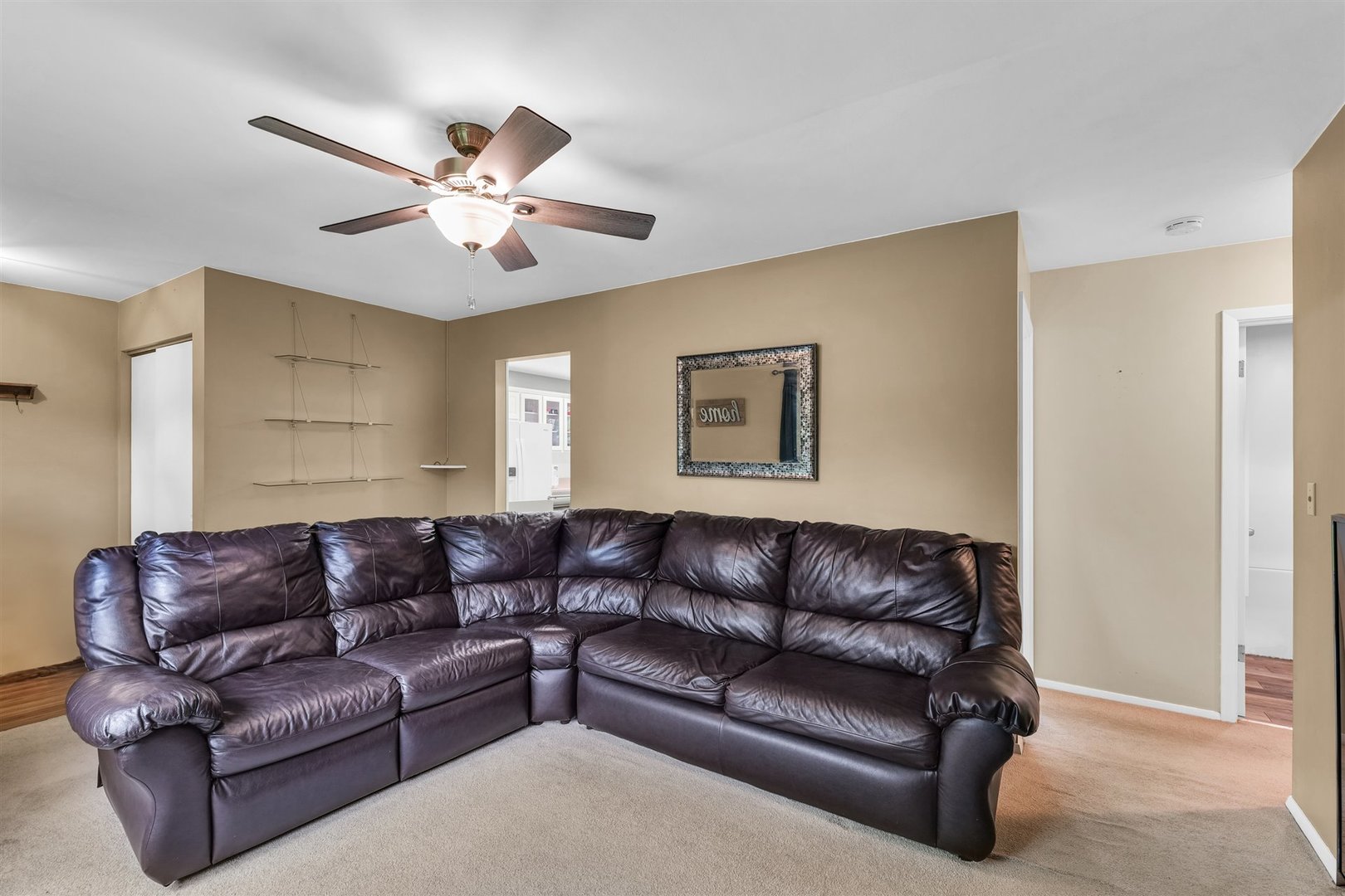 2603 Trafalgar Square Champaign, IL 61821 - Photo 9 of 32 a living room with couches and a ceiling fan