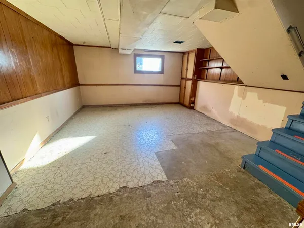 a utility room with closet dryer and washer