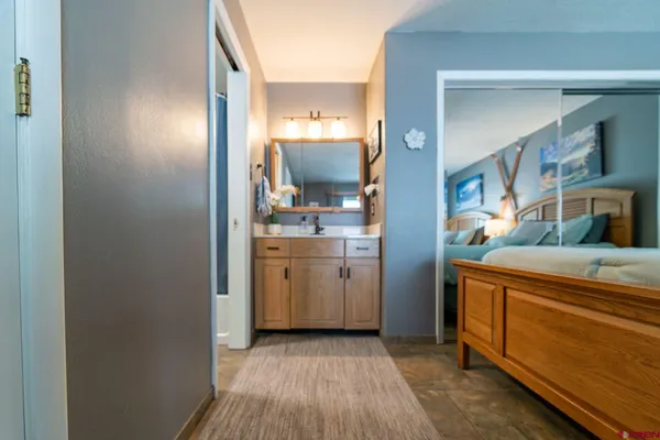 a view of a kitchen from a closet