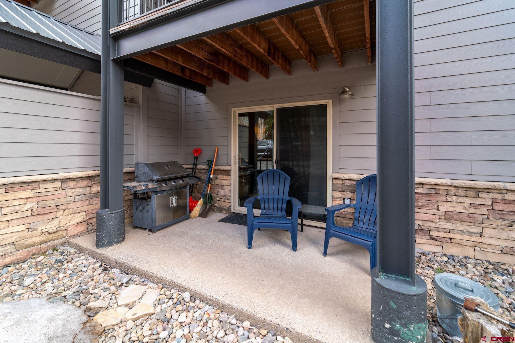 395 Sheol Street, Unit 26 Durango, CO 81301 - Photo 2 of 30 a view of a two chairs in the balcony