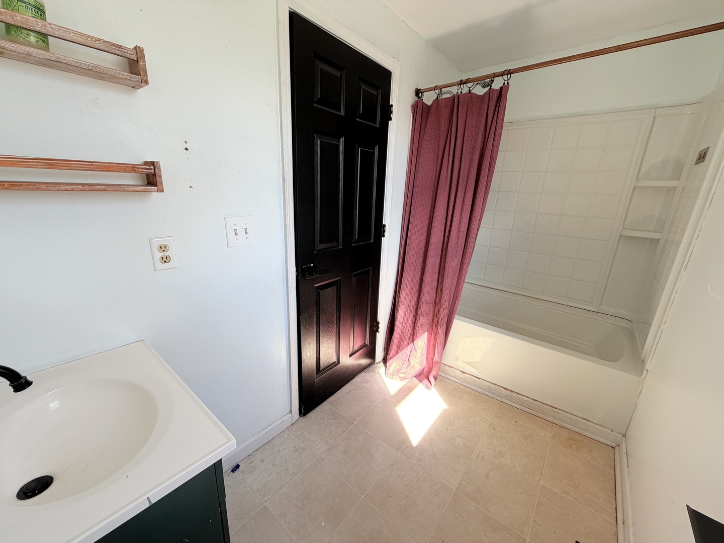 608 West Cedar Street Le Roy, IL 61752 - Photo 10 of 17 a bathroom with a sink and a shower