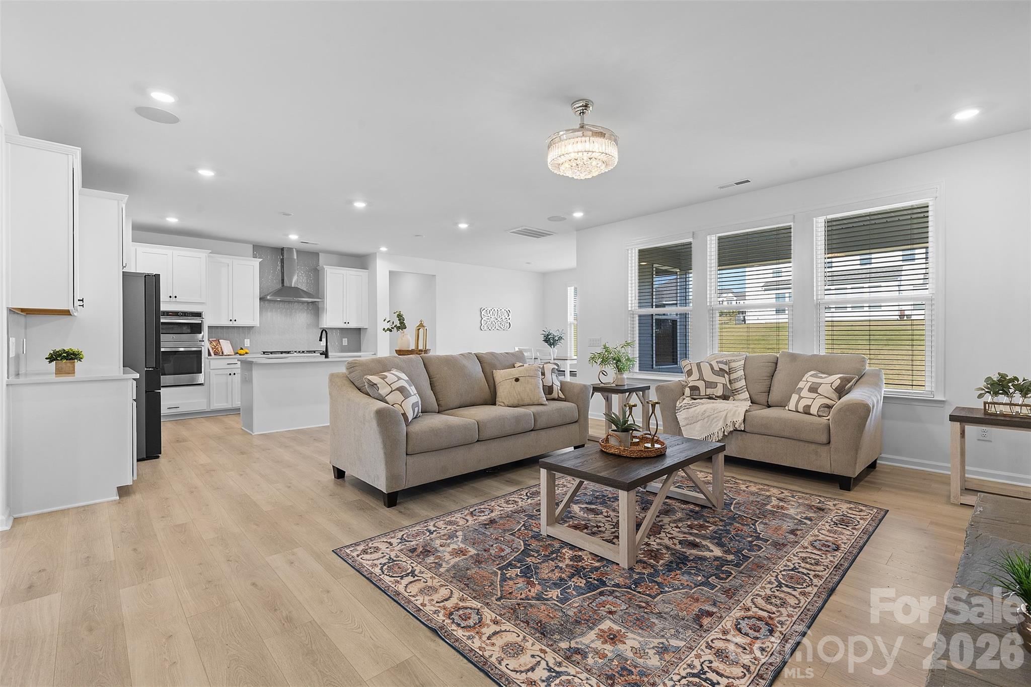 1170 Sugar Crk Road Fort Mill, SC 29707 - Photo 15 of 47 a living room with furniture and kitchen view