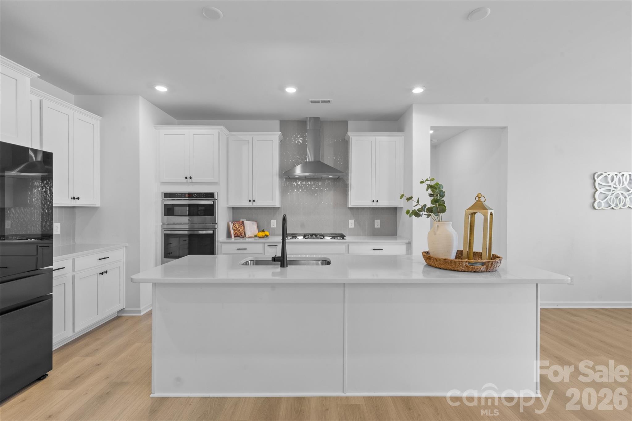 1170 Sugar Crk Road Fort Mill, SC 29707 - Photo 18 of 47 a kitchen with stainless steel appliances granite countertop a refrigerator and a sink