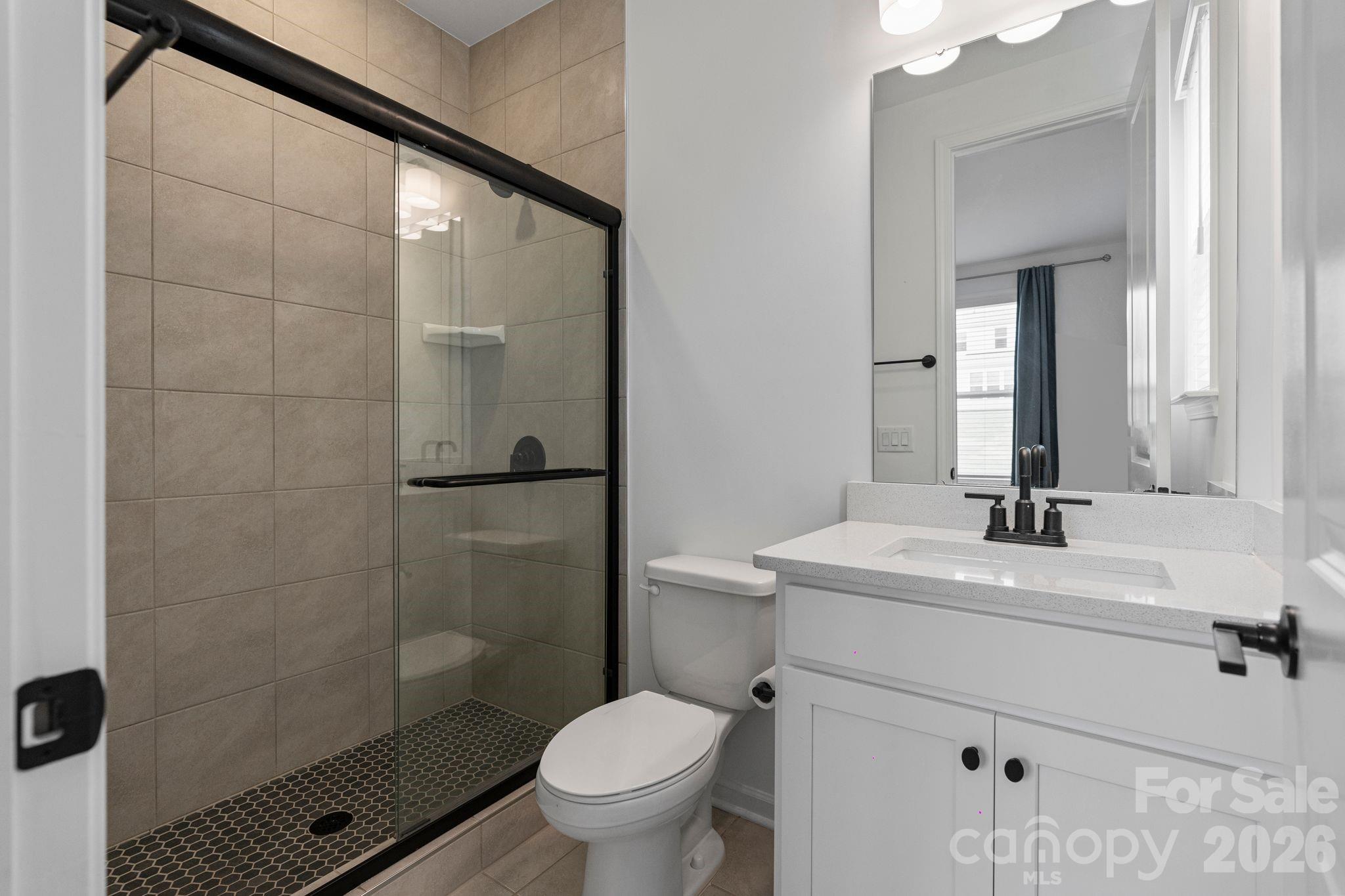 1170 Sugar Crk Road Fort Mill, SC 29707 - Photo 34 of 47 a bathroom with a sink toilet and shower