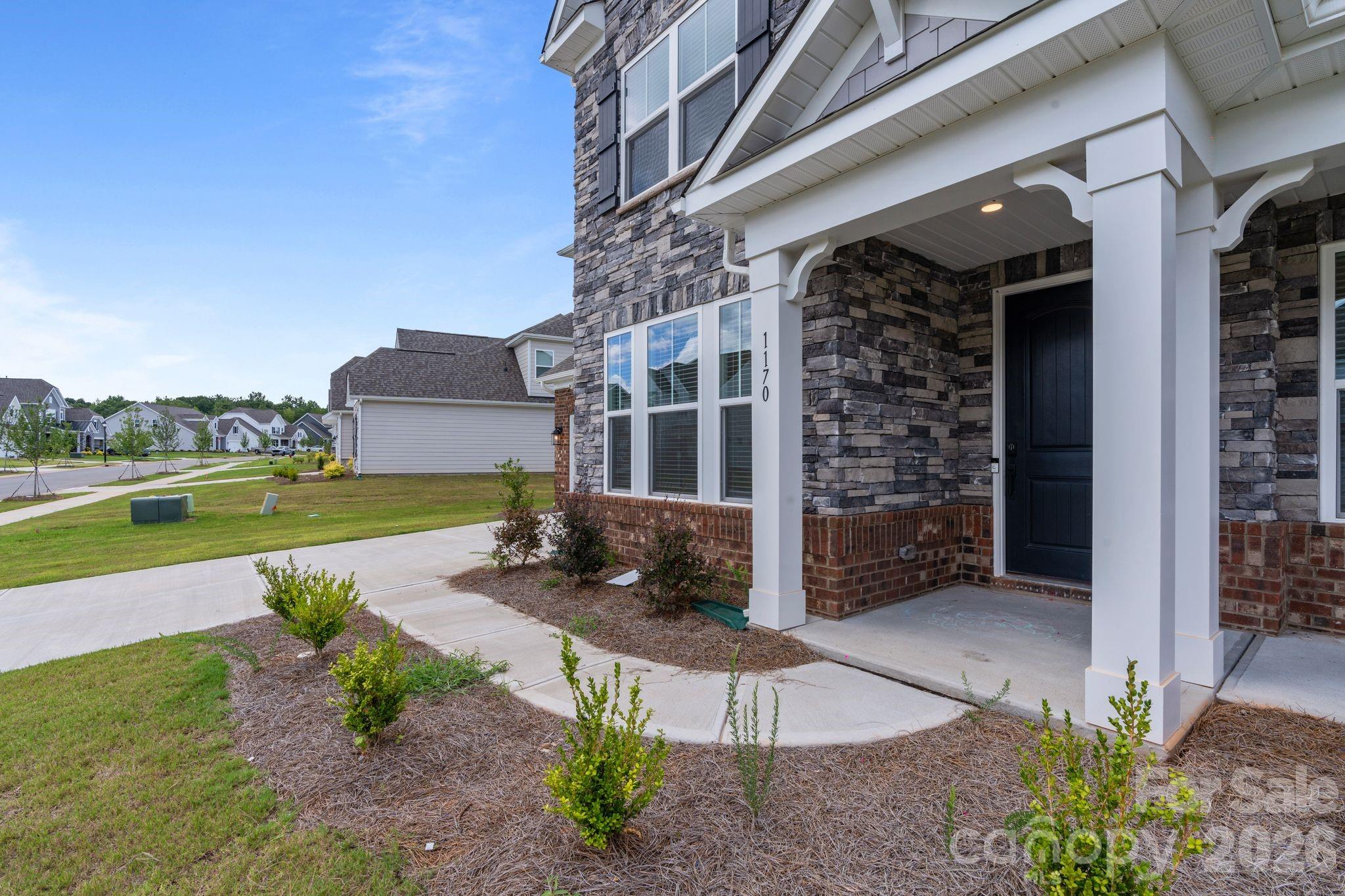 1170 Sugar Crk Road Fort Mill, SC 29707 - Photo 6 of 47 a view of a house with a yard