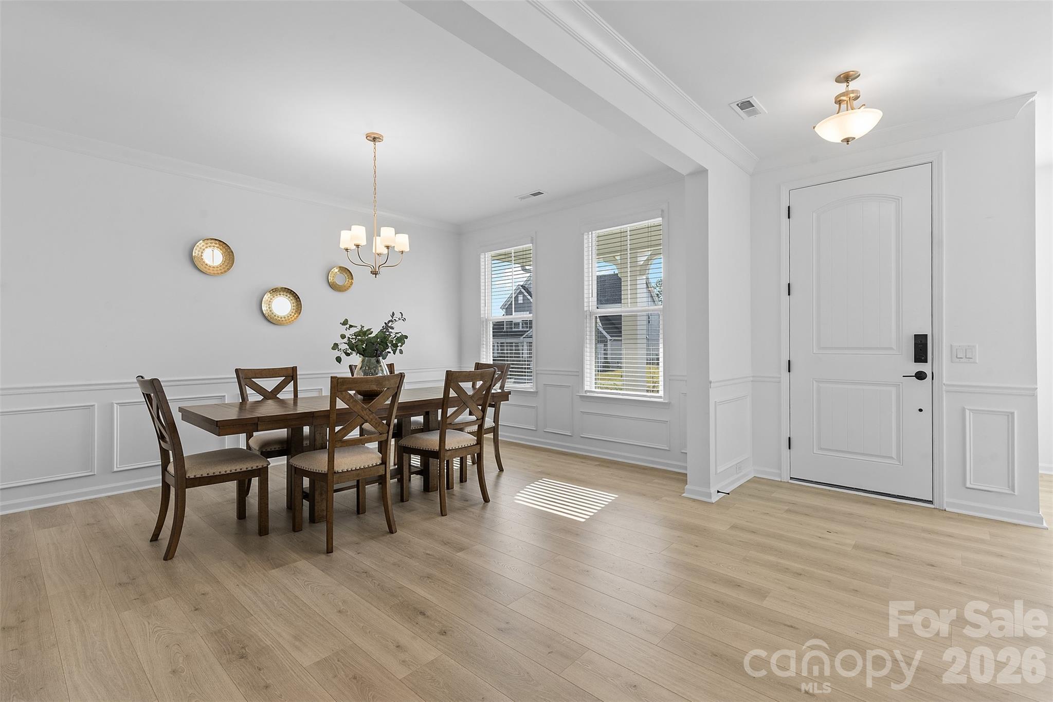 1170 Sugar Crk Road Fort Mill, SC 29707 - Photo 9 of 47 a view of a dining room with furniture and chandelier