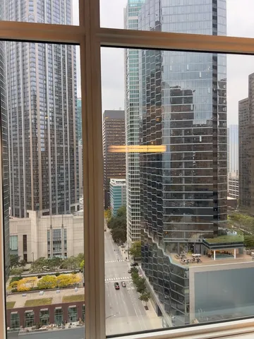 a view of a door and a window