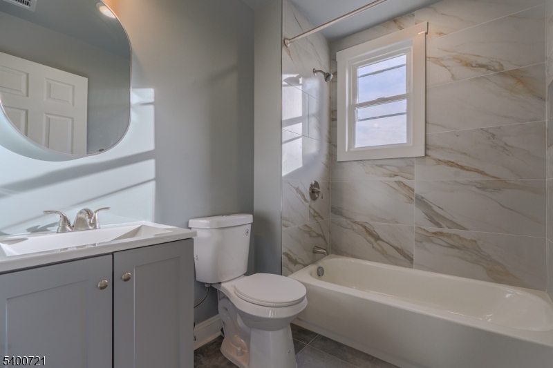 882 South 14th Street, Unit 3 Newark, NJ 07108 - Photo 16 of 20 a bathroom with a sink toilet and bathtub