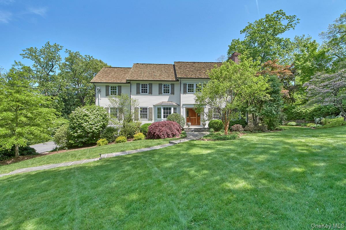 35 Overlook Drive Chappaqua, NY 10514 - Photo 1 of 1 a front view of a house with a garden