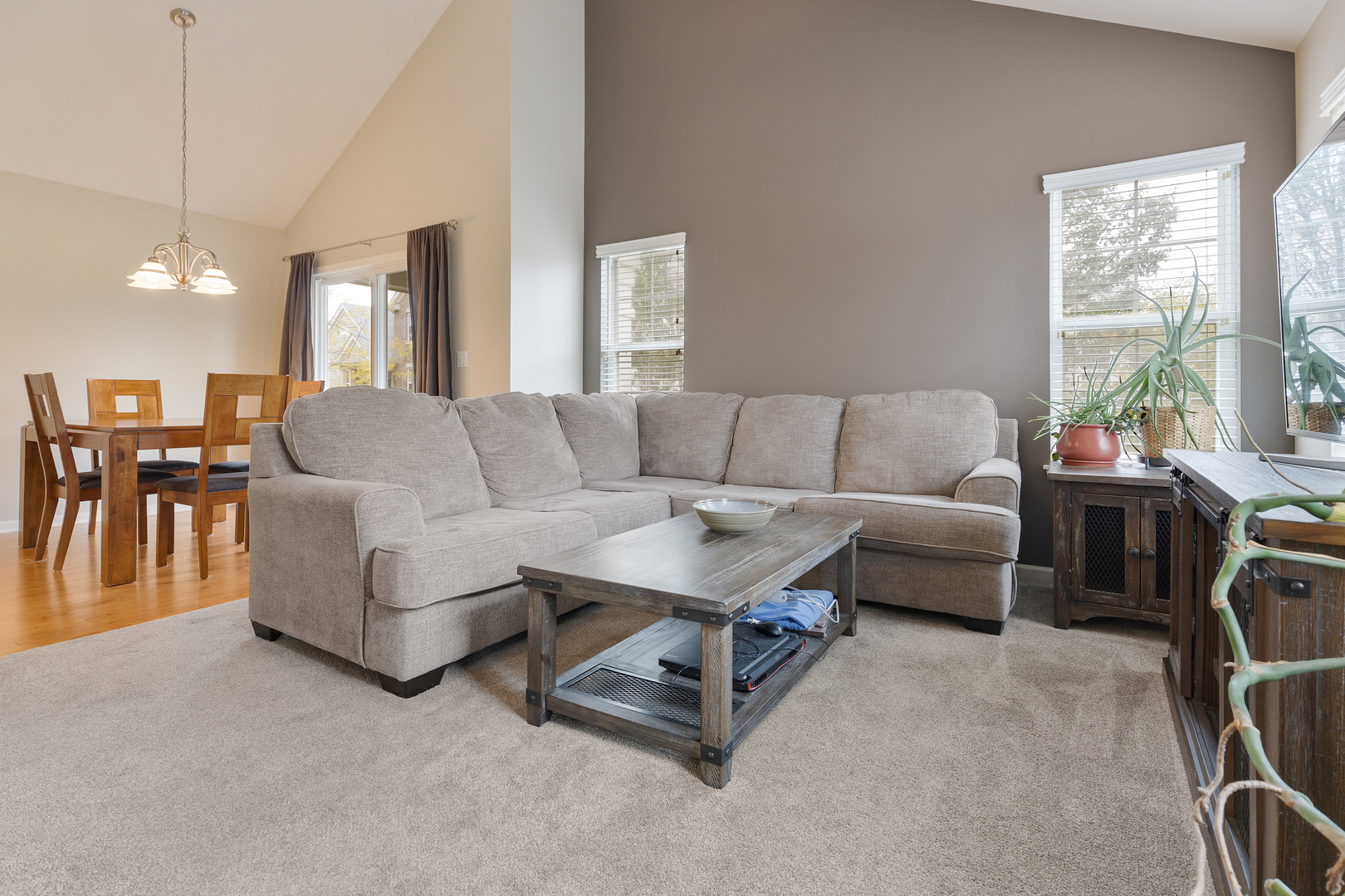 1641 Sandcastle Lane Pingree Grove, IL 60140 - Photo 8 of 15 a living room with furniture and a large window