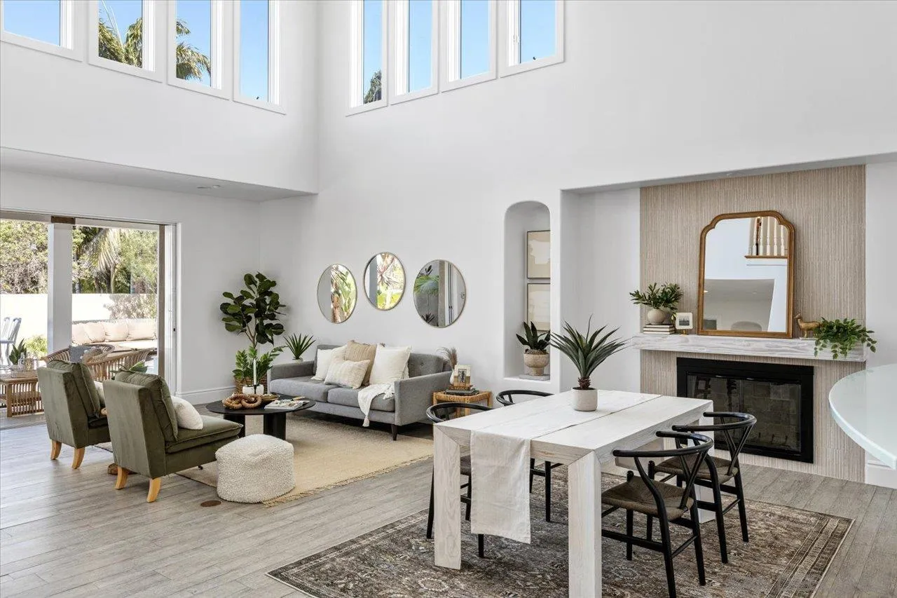 1066 Melba Road Encinitas, CA 92024 - Photo 1 of 54 a living room with furniture a window and wooden floor