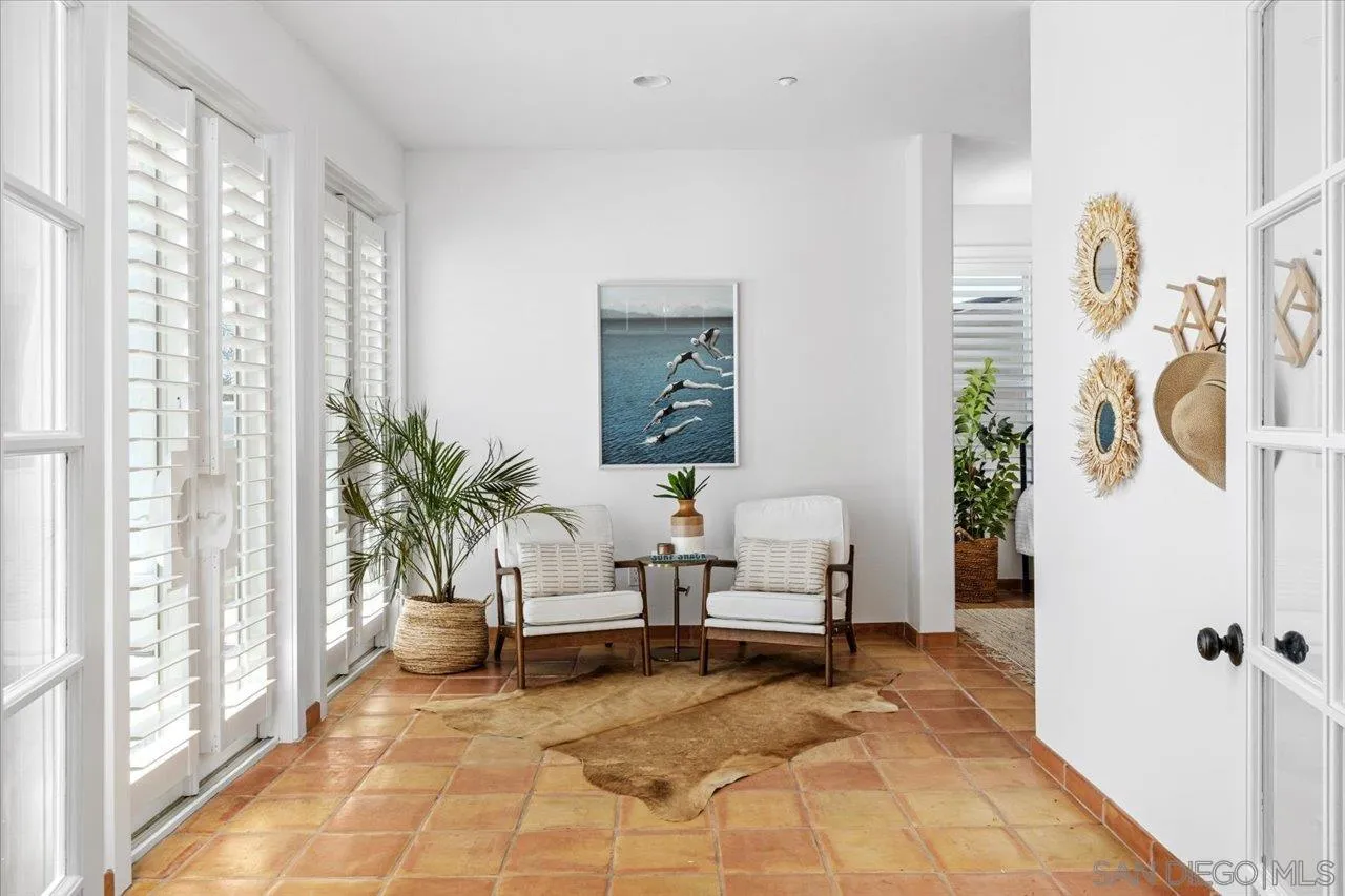 1066 Melba Road Encinitas, CA 92024 - Photo 13 of 54 a living room with furniture and a potted plant