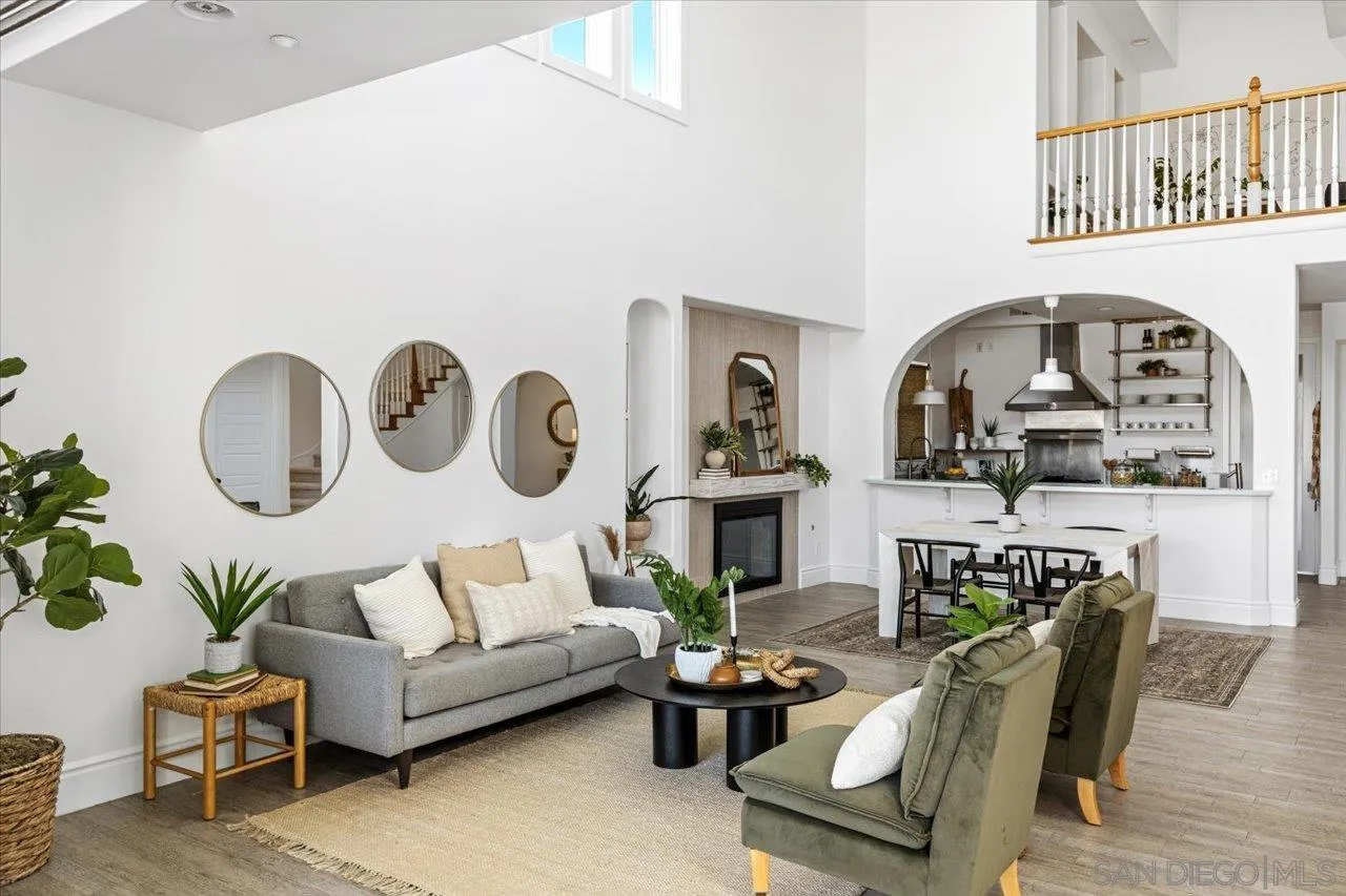 1066 Melba Road Encinitas, CA 92024 - Photo 27 of 54 a living room with furniture and a wooden floor