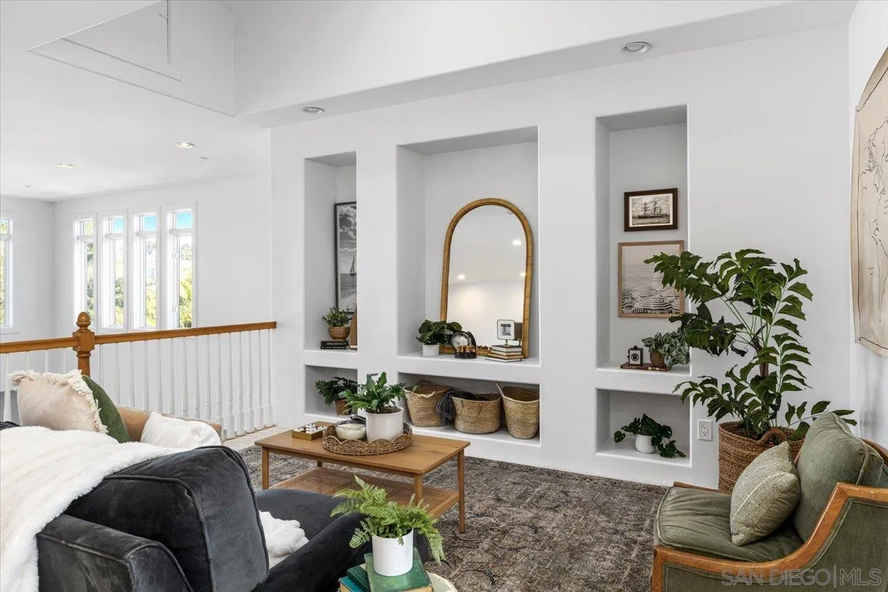 1066 Melba Road Encinitas, CA 92024 - Photo 35 of 54 a living room with furniture and a potted plant
