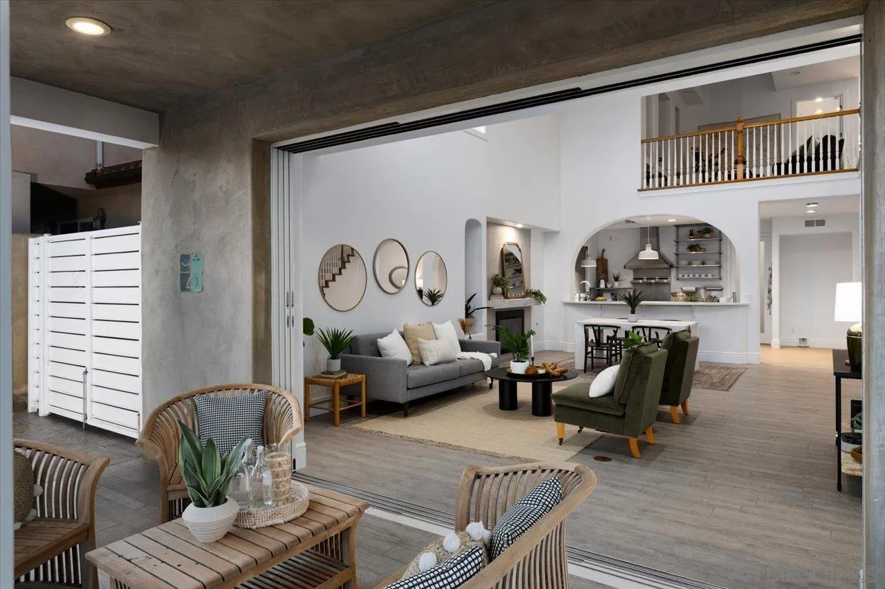 1066 Melba Road Encinitas, CA 92024 - Photo 6 of 54 a living room with furniture fireplace and window