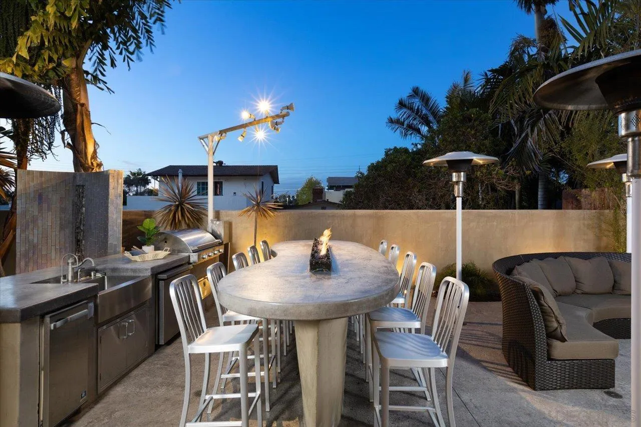 1066 Melba Road Encinitas, CA 92024 - Photo 10 of 54 a balcony with table and chairs