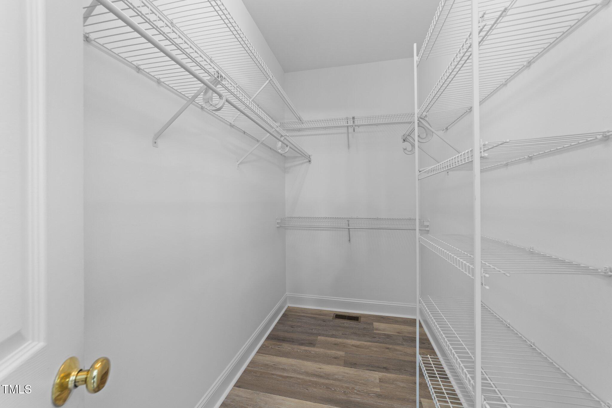 3525 La Costa Way Raleigh, NC 27610 - Photo 19 of 45 a view of an empty walk in closet