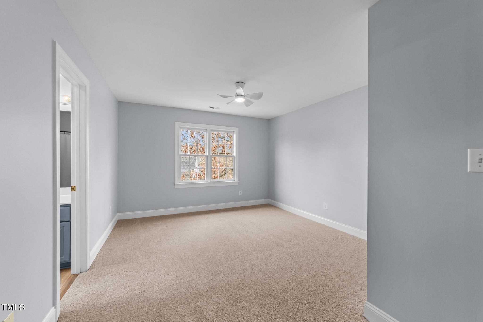 3525 La Costa Way Raleigh, NC 27610 - Photo 24 of 45 a view of an empty room with a window