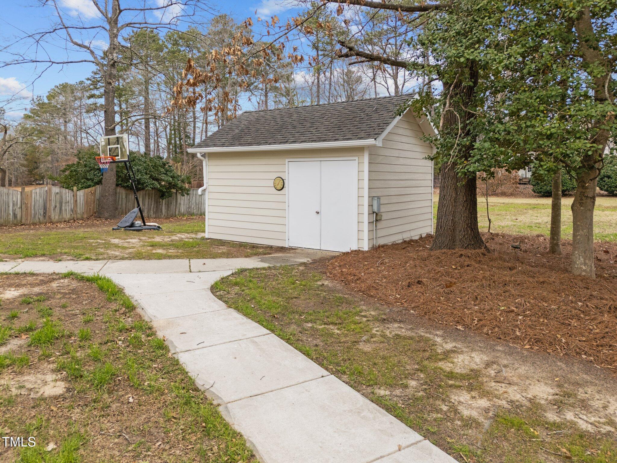 3525 La Costa Way Raleigh, NC 27610 - Photo 33 of 45 a front view of a house with a yard and garage