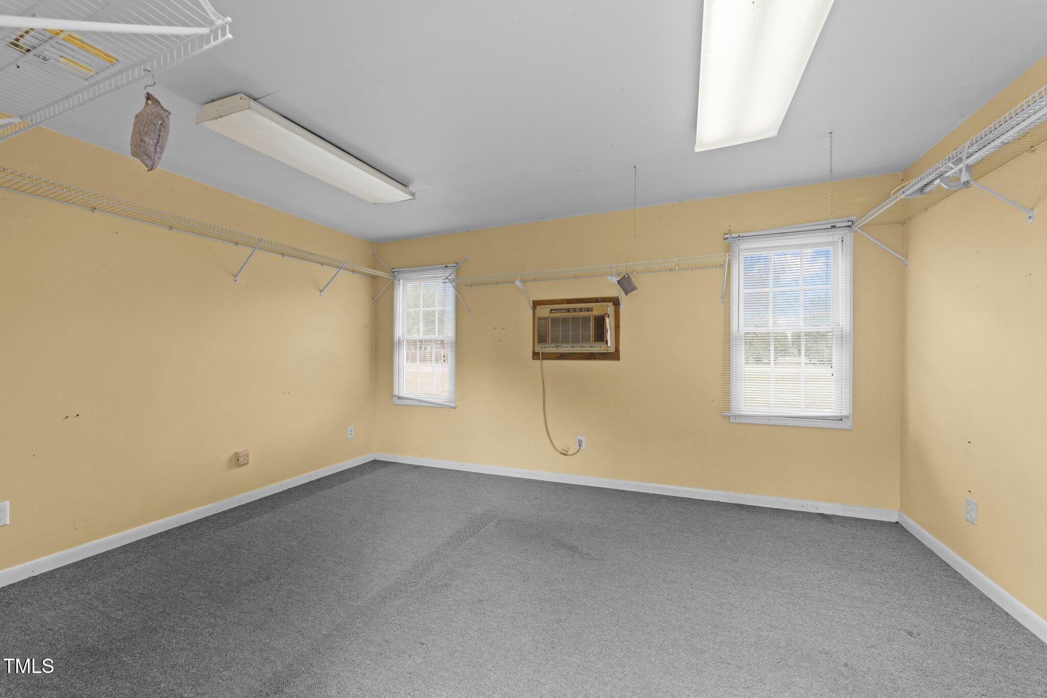 3525 La Costa Way Raleigh, NC 27610 - Photo 34 of 45 a view of empty room with windows