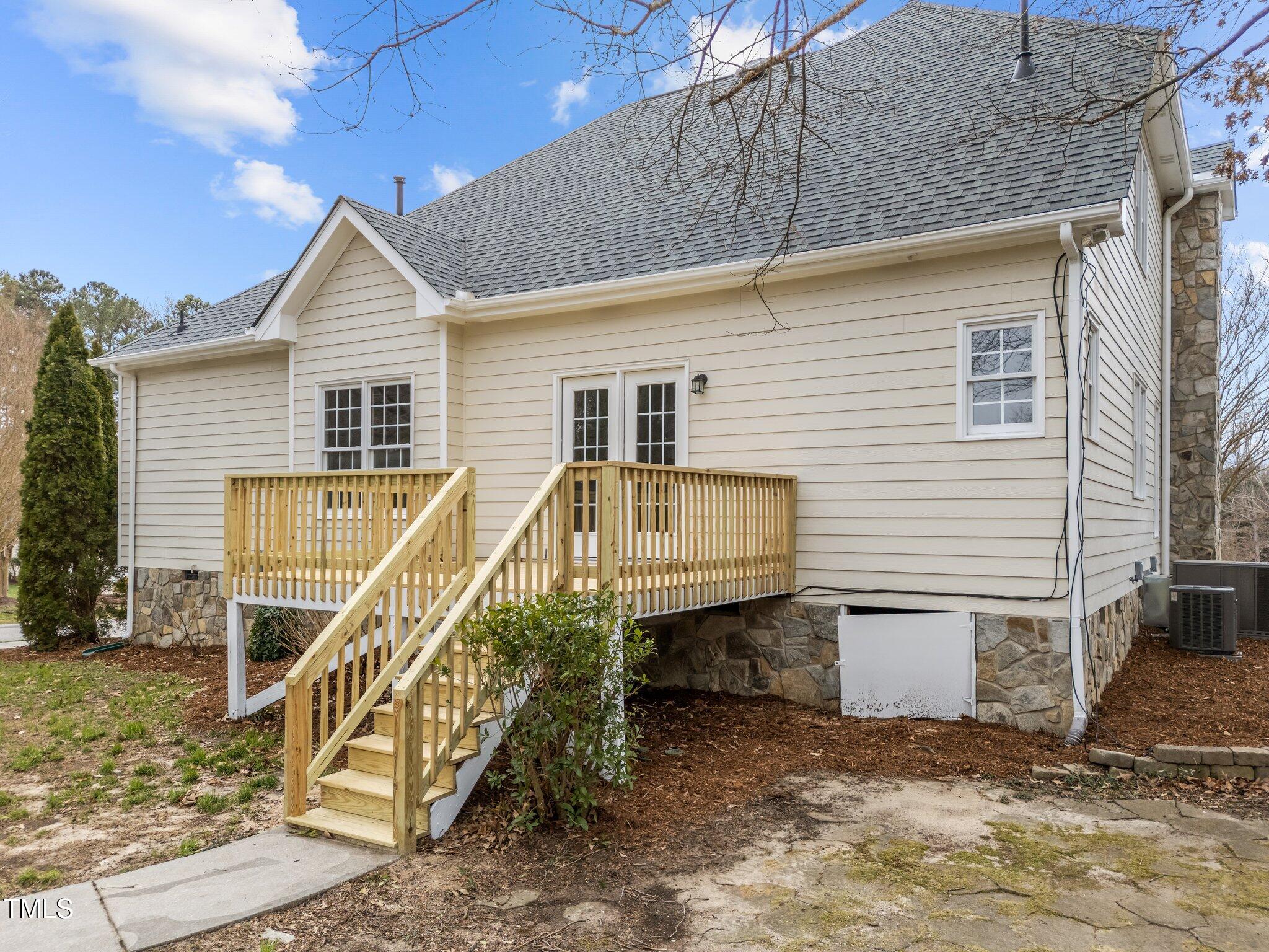 3525 La Costa Way Raleigh, NC 27610 - Photo 35 of 45 a view of a house with a small yard and wooden fence