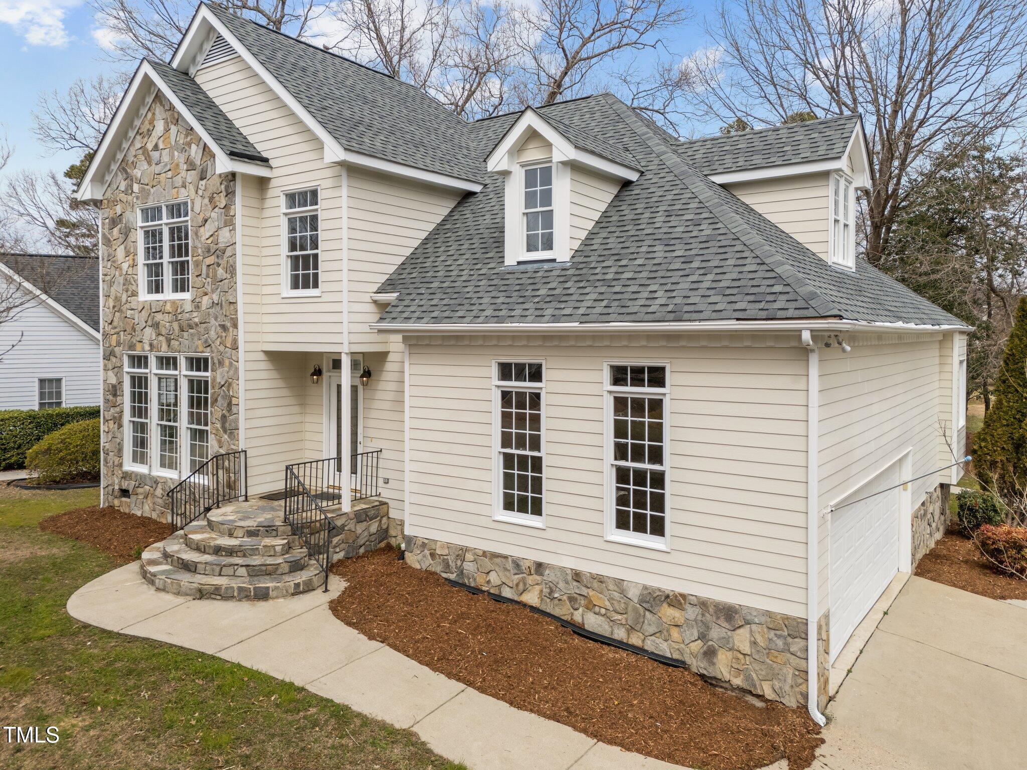 3525 La Costa Way Raleigh, NC 27610 - Photo 3 of 45 a front view of a house with a yard