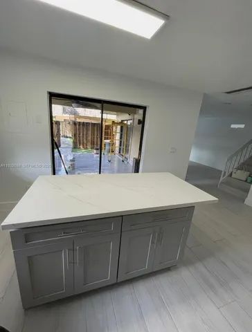 a room with a bed and window