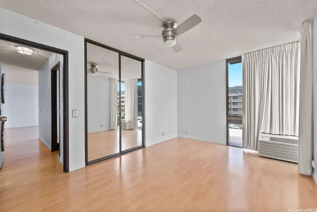 a view of an empty room with a window