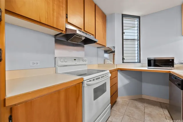 a utility room with washer and dryer
