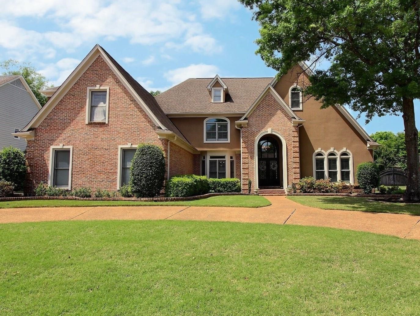 595 Kenrose Street Collierville, TN 38017 - Photo 1 of 38 a front view of a house with a yard