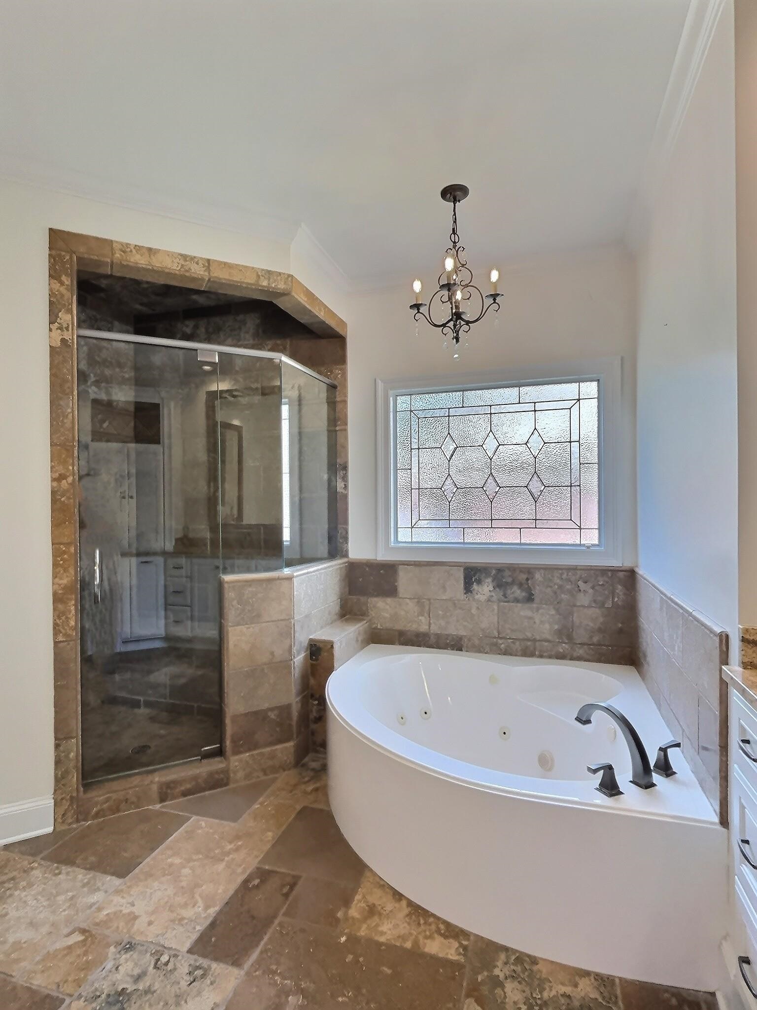 595 Kenrose Street Collierville, TN 38017 - Photo 20 of 38 a bathroom with a bathtub