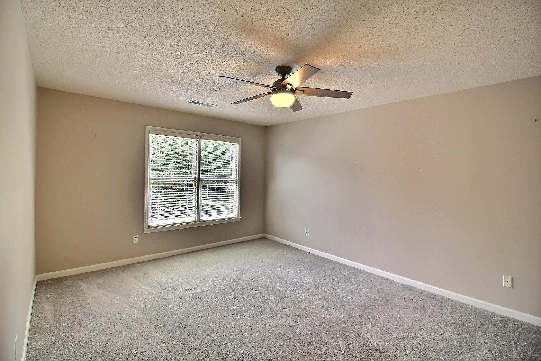 595 Kenrose Street Collierville, TN 38017 - Photo 26 of 38 a view of room with a ceiling fan and a window
