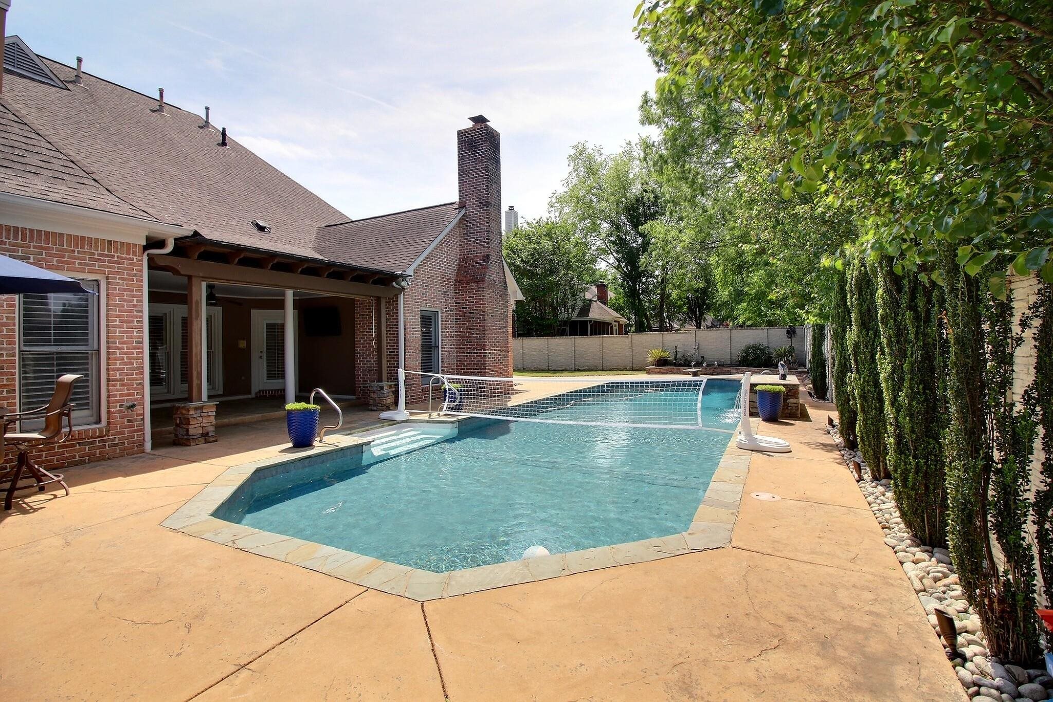 595 Kenrose Street Collierville, TN 38017 - Photo 34 of 38 a view of a backyard with swimming pool