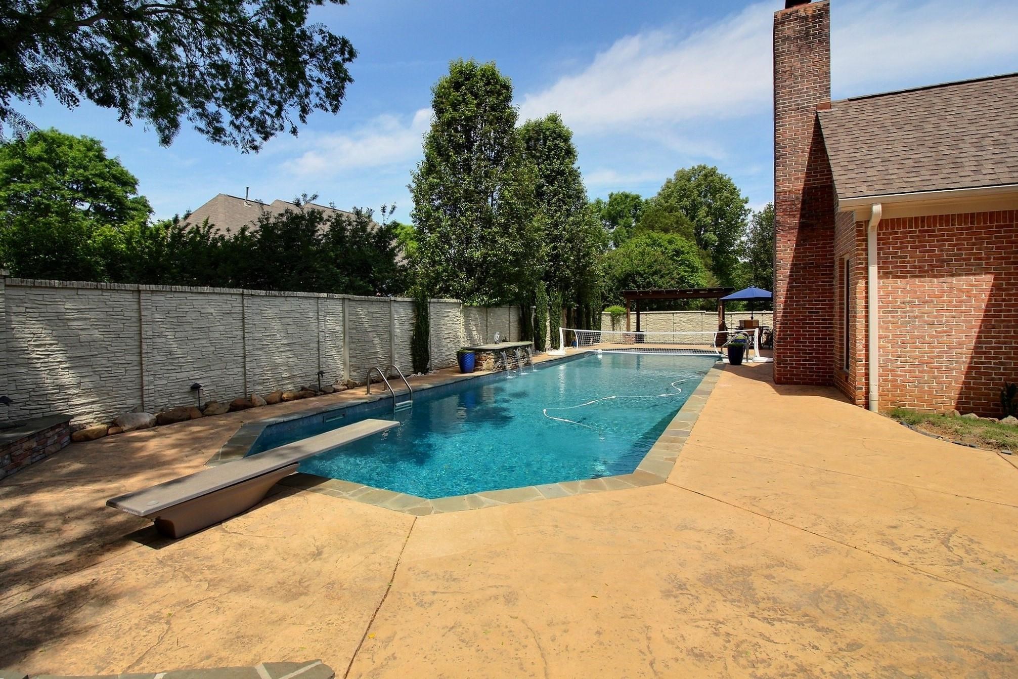 595 Kenrose Street Collierville, TN 38017 - Photo 36 of 38 a view of a swimming pool with a patio
