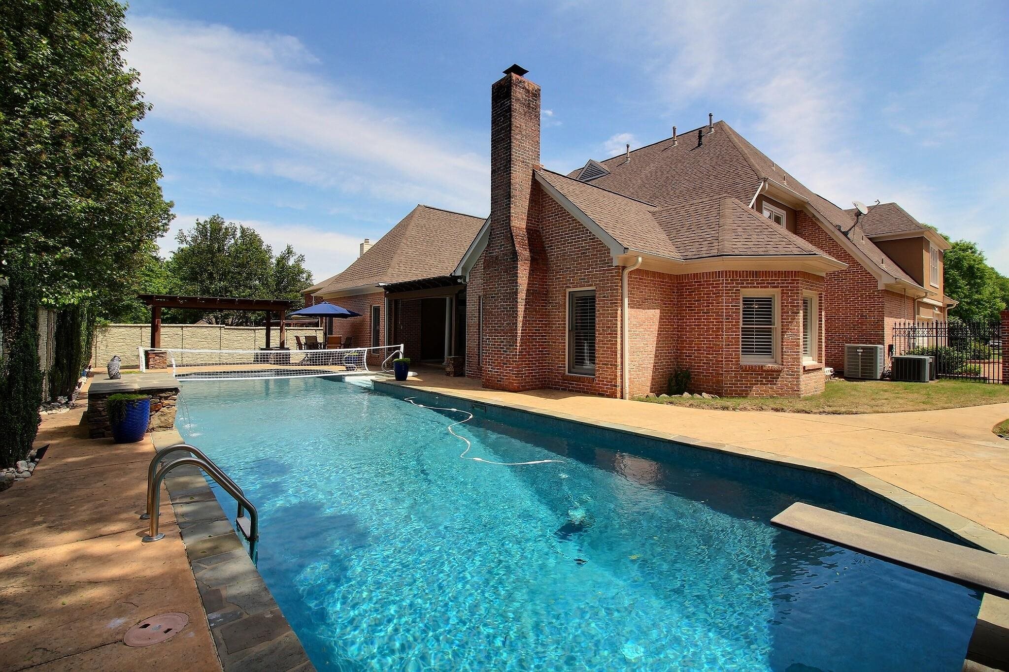 595 Kenrose Street Collierville, TN 38017 - Photo 37 of 38 a front view of a house with a yard