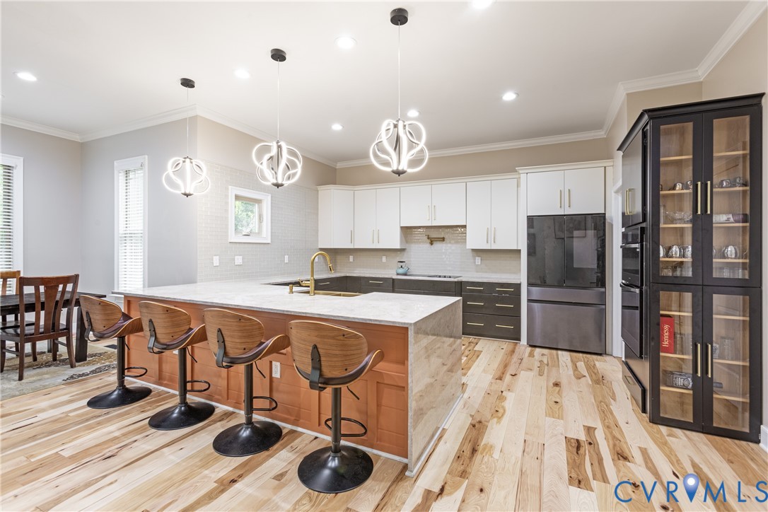 12554 Kain Road Glen Allen, VA 23059 - Photo 19 of 75 a large kitchen with a table and chairs